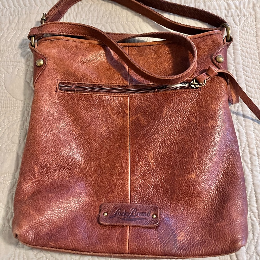 Lucky Brand soft brown leather cross body purse.